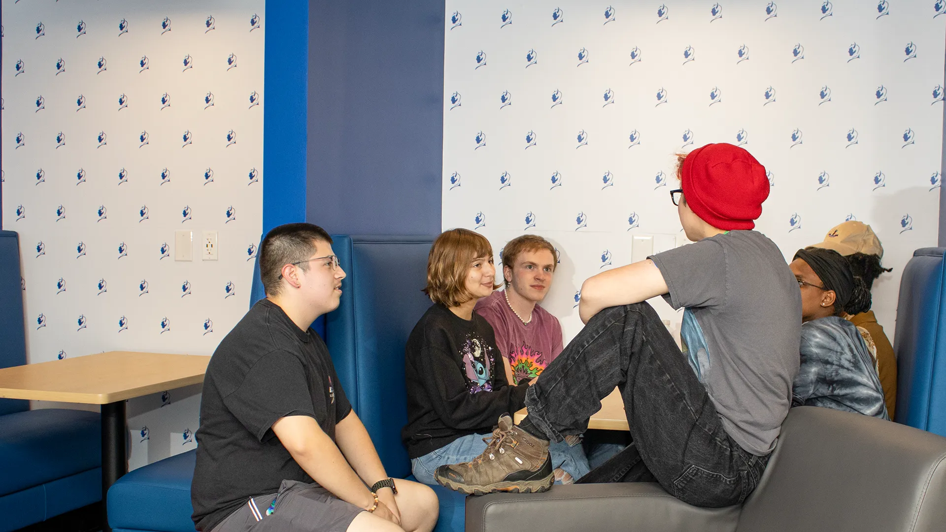Students just relaxing in the cozy atmosphere of Centennial Hall atrium.