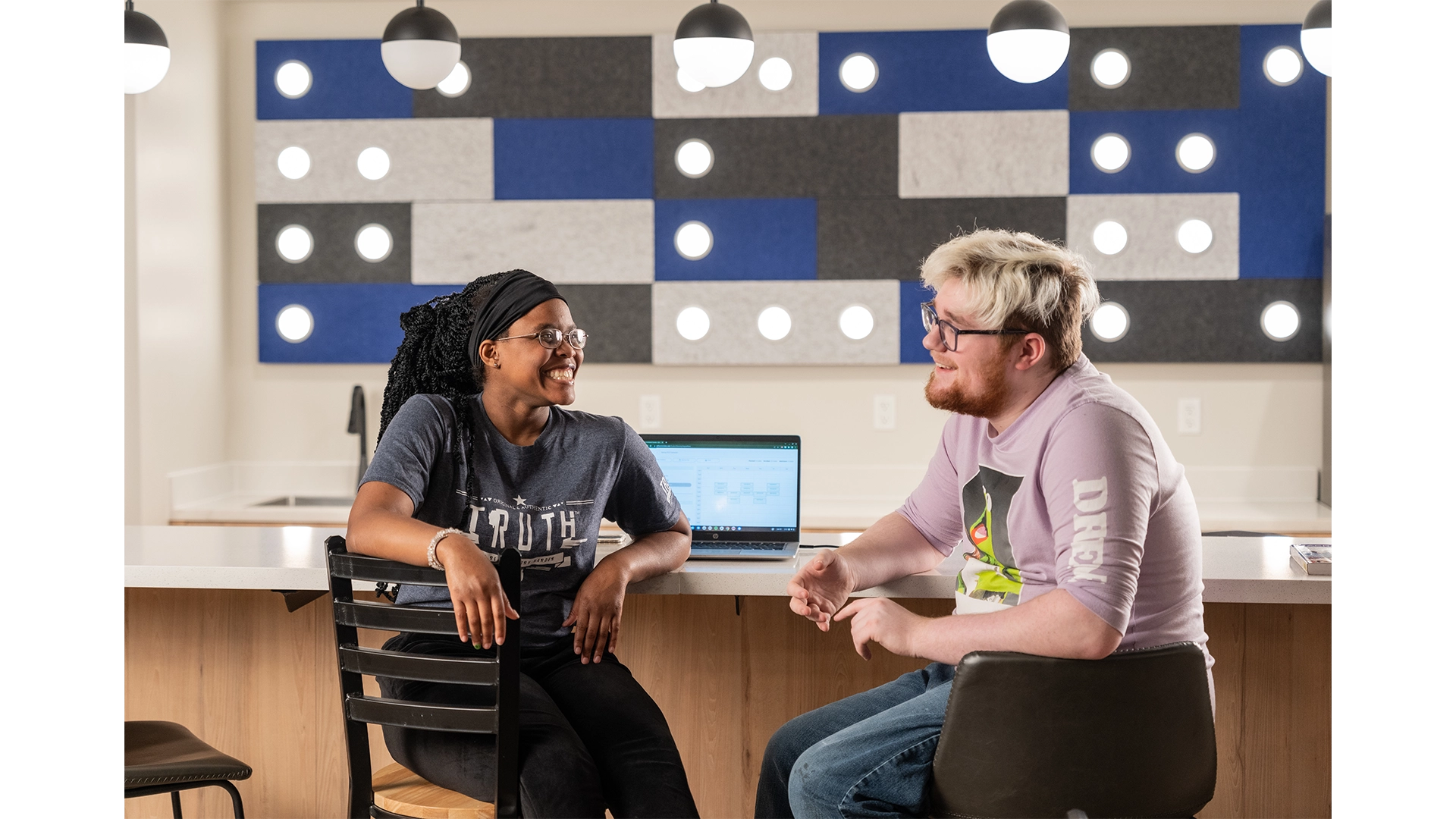 Students hanging out in the atrium area.