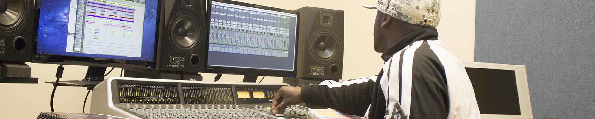 A student works at an Audio Engineering classroom workstation
