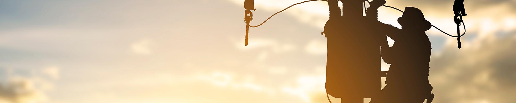 Photo of a lineman working