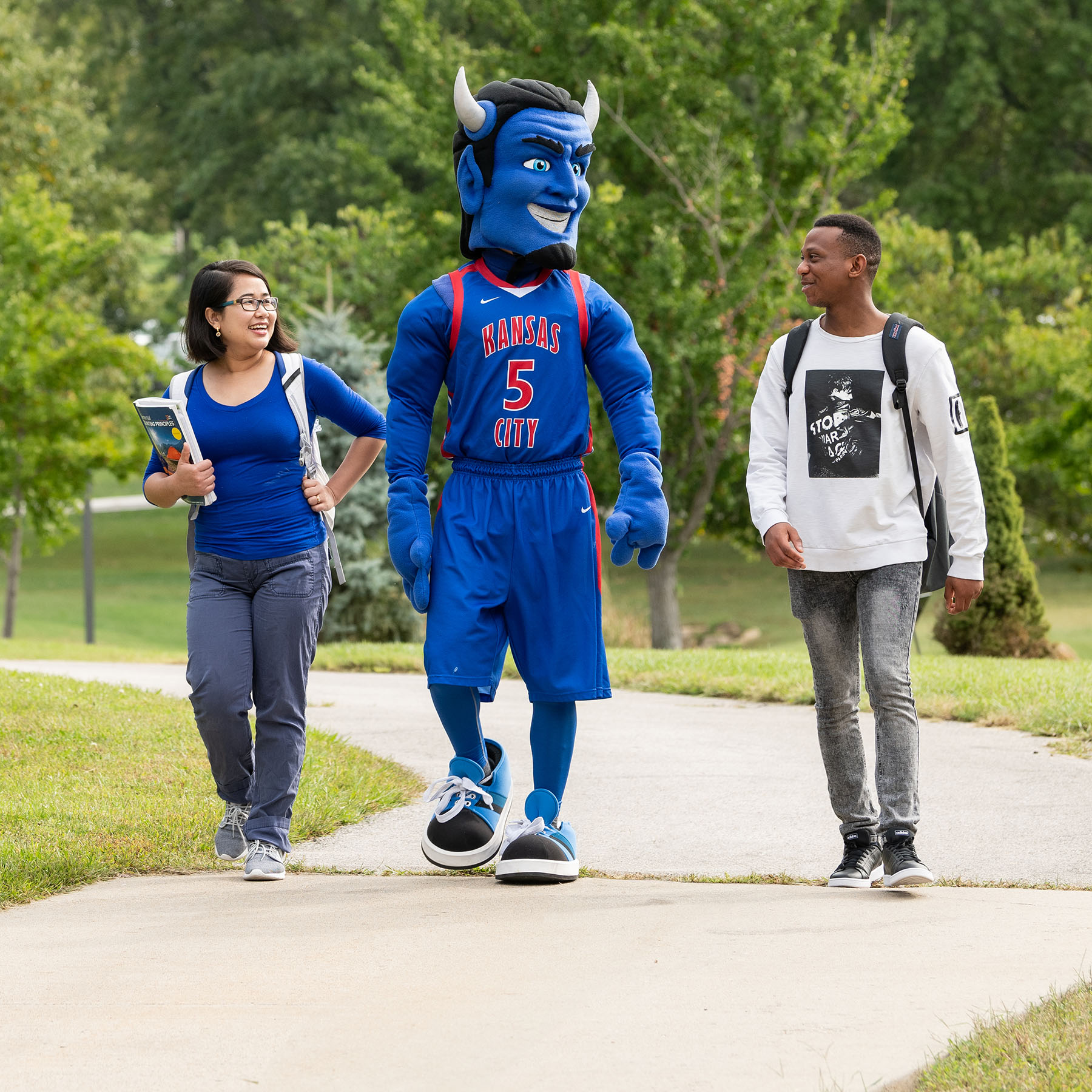 Blue with students