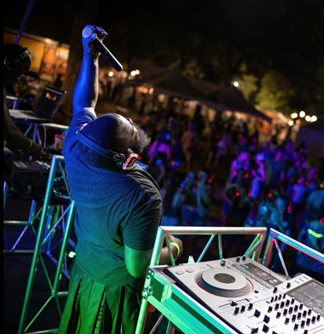 DJ Joe rocking out to a live crowd.