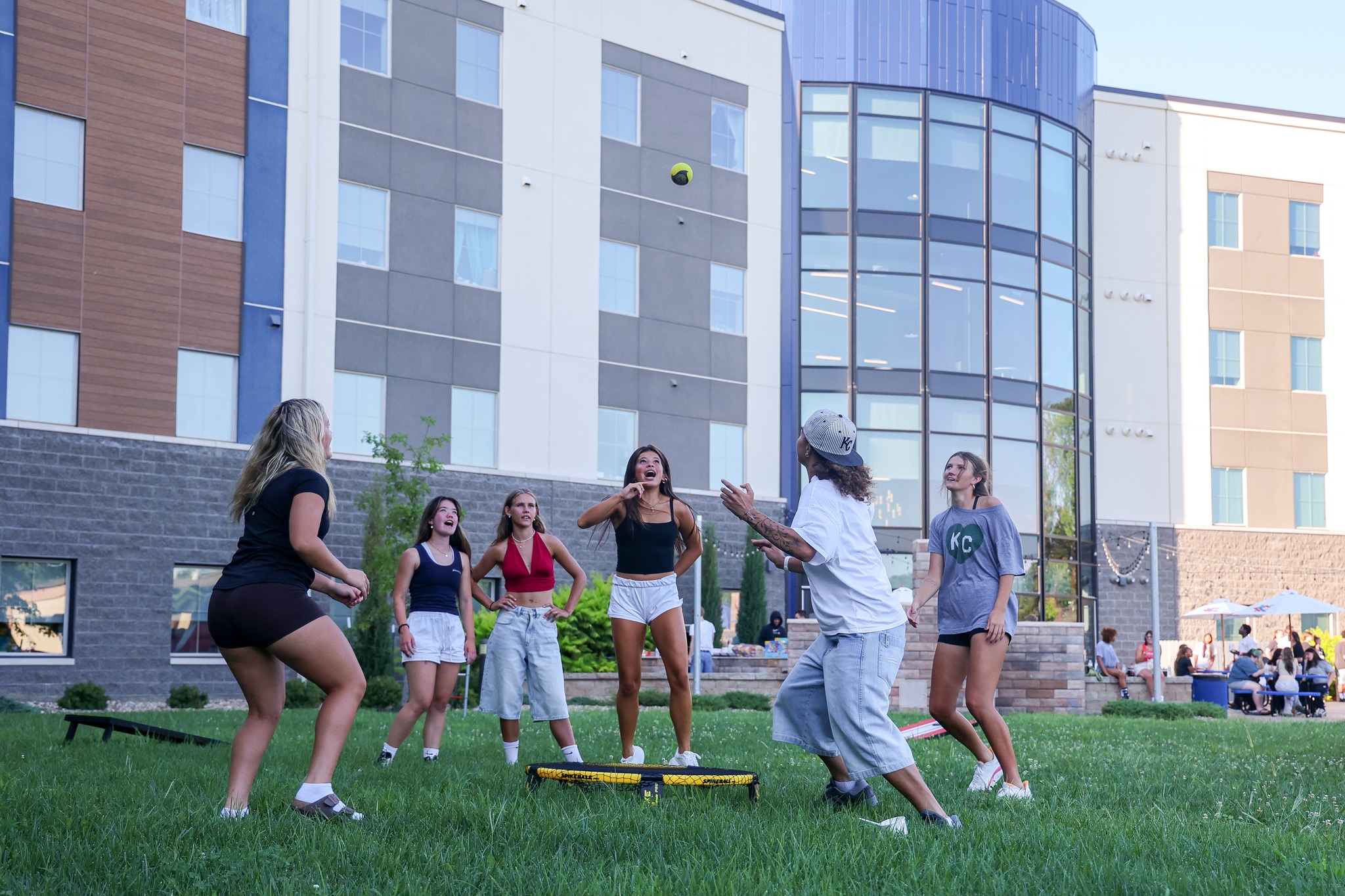 Students playing games in front of Centennial Hall.