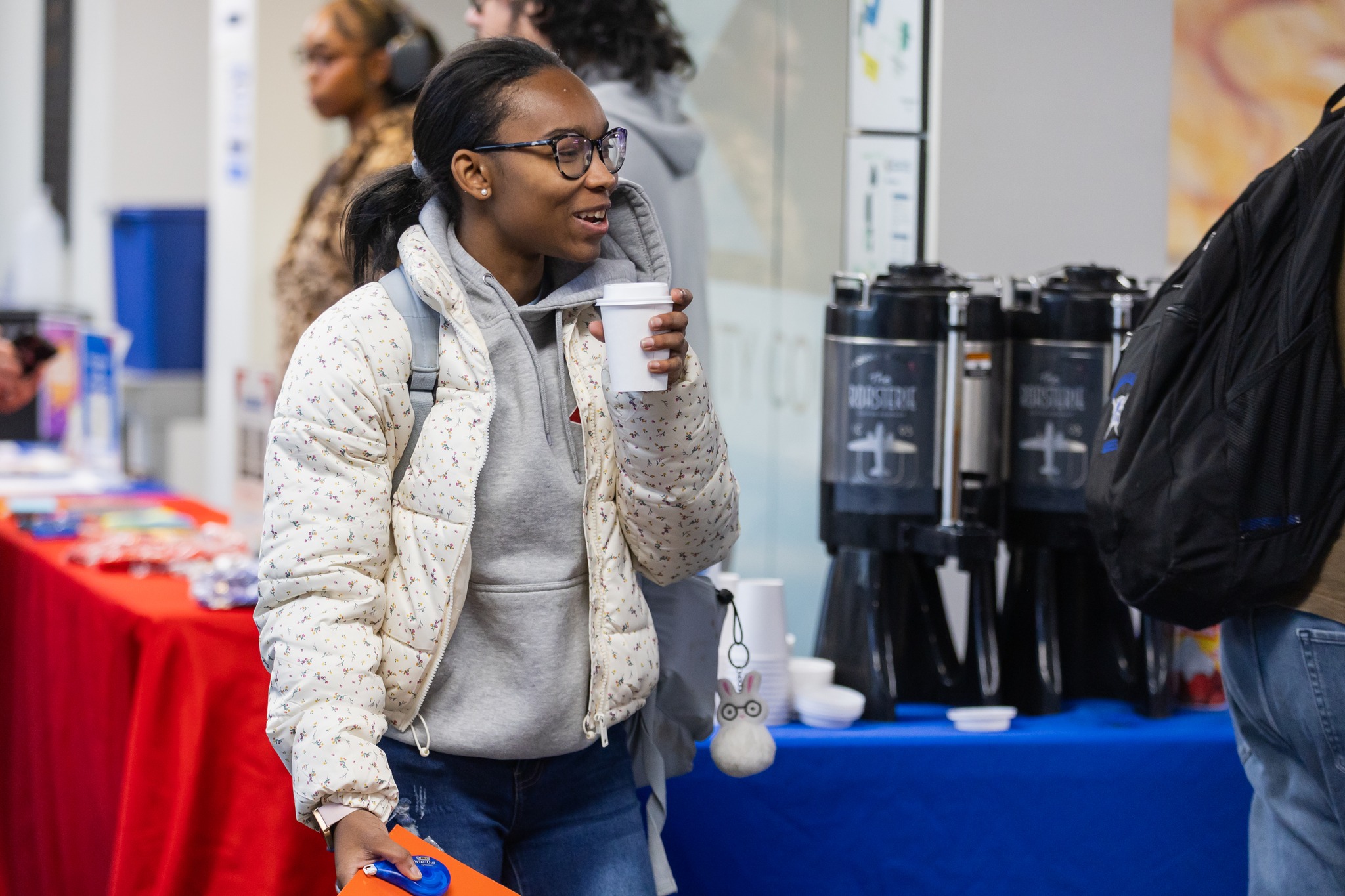 Girl drinking a cup of coffee.