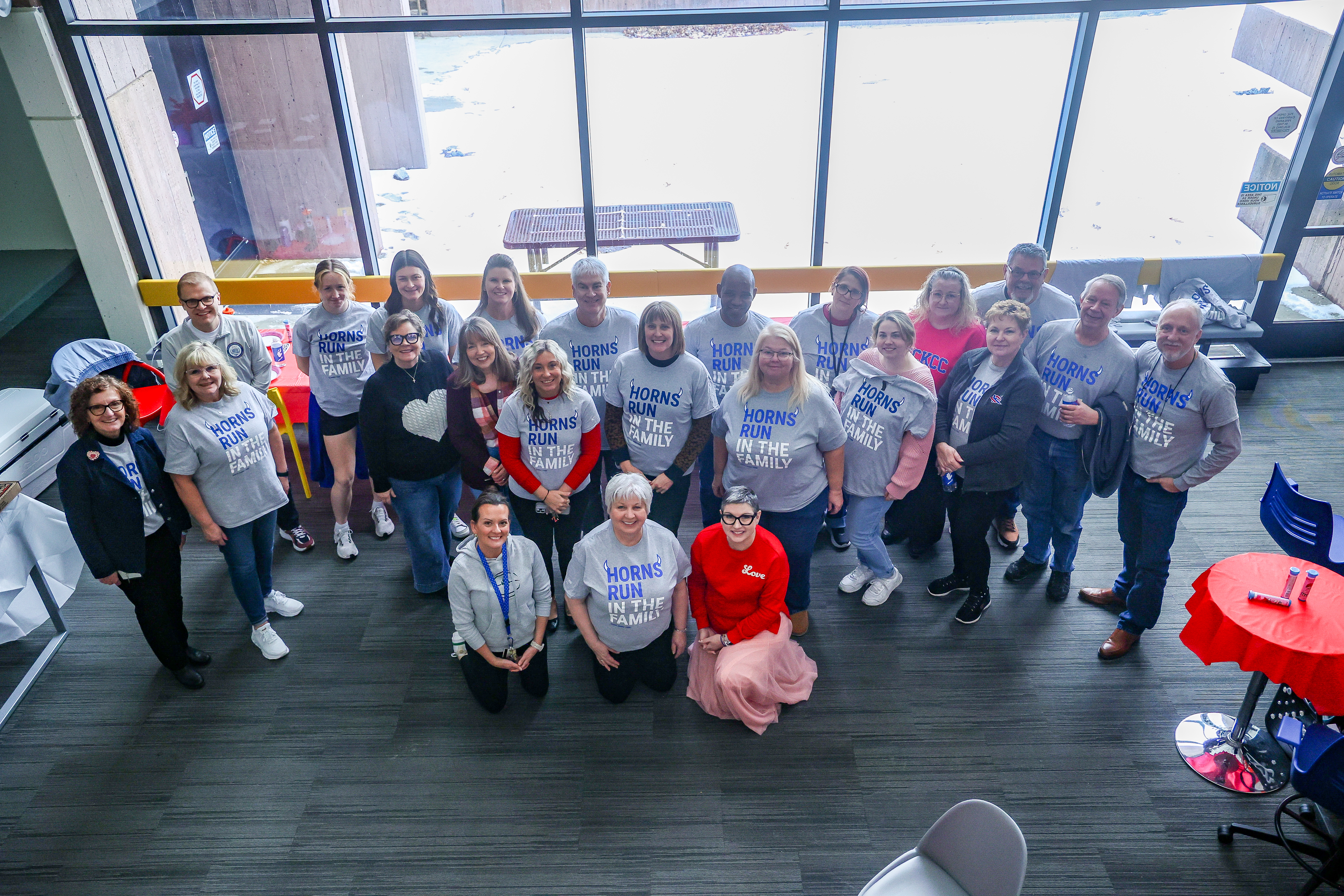 Large group photo with the people wearing Family Fund t-shirts.