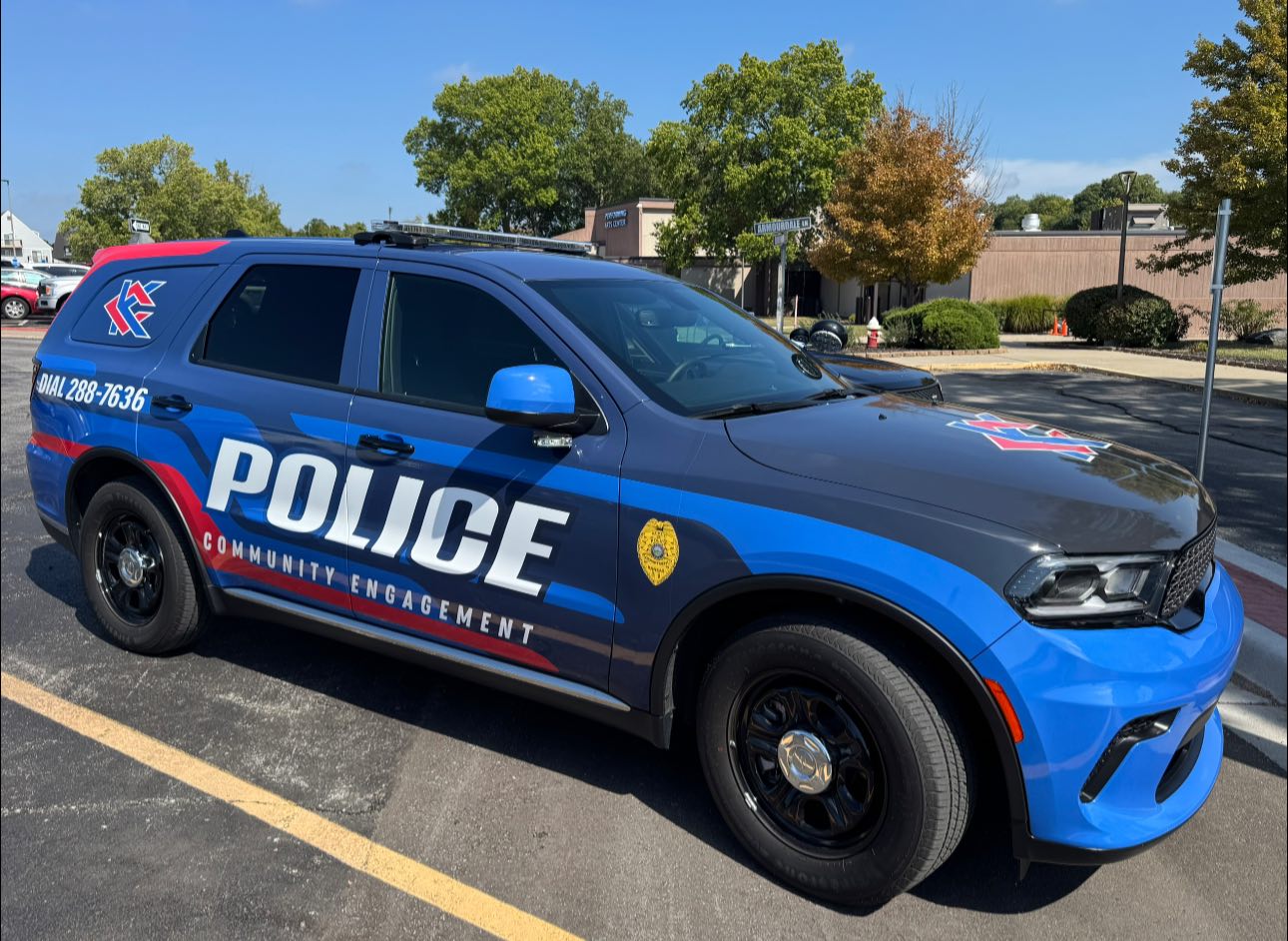 KCKCC police vehicle sitting in parking lot.
